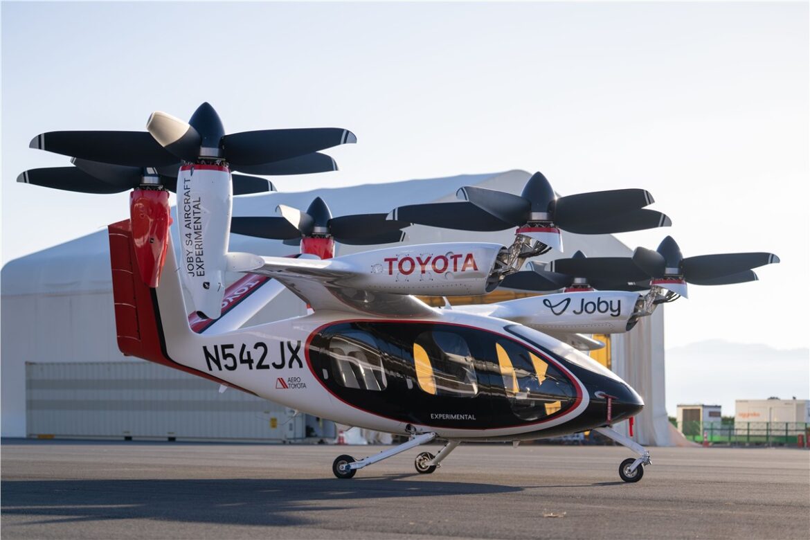 Joby Aviation Toyota joint venture, Joby Toyota manufacturing alliance, Joby Aviation eVTOL, Toyota air mobility partnership, electric vertical takeoff aircraft, Joby eVTOL manufacturing, air mobility manufacturing, Joby Aviation production capacity, Toyota electric aviation partnership, advanced air mobility,